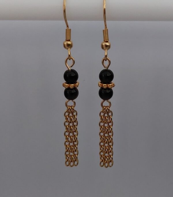 Boucles obsidienne dorée